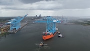 Two giant container cranes arrive in Mobile on July 17, 2024, after a lengthy voyage from China. The cranes will join four already in place at the container terminal operated by APM Terminals