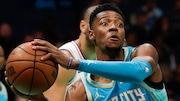 Charlotte Hornets forward Brandon Miller looks to pass against the Philadelphia 76ers during the first half of an NBA basketball game in Charlotte, N.C., Saturday, Dec. 16, 2023. (AP Photo/Nell Redmond)