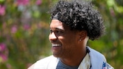 Miami Dolphins quarterback Tua Tagovailoa speaks to members of the media after an NFL football practice at the team's practice facility, Tuesday, June 4, 2024, in Miami Gardens, Fla. (AP Photo/Wilfredo Lee)