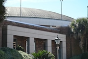 The Mobile Civic Center as pictured on Tuesday, Jan. 30, 2024. A sidewalk on the Conception Street side of the Civic Center Theater has been barricade to protect the public from the potential of falling bricks.