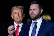 FILE - Republican Ohio Senate candidate JD Vance speaks as Republican presidential candidate former President Donald Trump listens at a campaign rally at Wright Bros. Aero Inc. at Dayton International Airport, Nov. 7, 2022, in Vandalia, Ohio. Trump says Vance will be his vice presidential pick for 2024. He says on his Truth Social Network that, “After lengthy deliberation and thought, and considering the tremendous talents of many others, I have decided that the person best suited to assume the position of Vice President of the United States is Senator J.D. Vance of the Great State of Ohio.” (AP Photo/Michael Conroy, File)