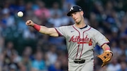 Atlanta Braves third baseman Zack Short throws to first to force out Chicago Cubs' Ian Happ during the third inning of a baseball game Tuesday, May 21, 2024, in Chicago. (AP Photo/Erin Hooley)