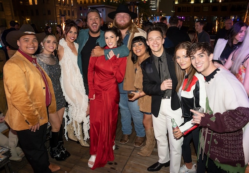 Triston Harper, far left, is seen with "American Idol" judge Luke Bryan and other Top 10 competitors during a celebration at The Aster in Hollywood. (Disney/Frank Micelotta)