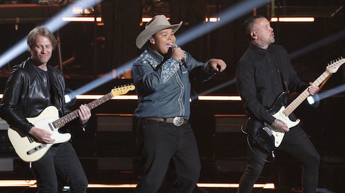 Triston Harper, center, performs on "American Idol" during the show's 2024 season. Harper, a 15-year-old from McIntosh, Ala., made it to the Top 5.