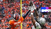 Denver Broncos cornerback Patrick Surtain II breaks up a pass to Las Vegas Raiders wide receiver Davante Adams during an NFL game on Sept. 10, 2023, at Empower Field at Mile High in Denver.