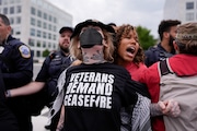 Washington Metropolitan Police clear demonstrators from blocking traffic, Wednesday, July 24, 2024, in Washington, ahead of a scheduled visit by Israeli Prime Minister Benjamin Netanyahu at the U.S. Capitol. (AP Photo/Mike Stewart)