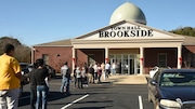 The town of Brookside, Alabama holds municipal court once a month. The courtroom and the parking lot are packed with people. Police must direct traffic before the 1 p.m. court session starts. (Joe Songer for AL.com).