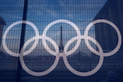 The Eiffel Tower is seen behind the Olympic rings, at the Trocadero plaza Thursday, July 18, 2024 in Paris.