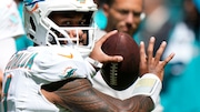 Miami Dolphins quarterback Tua Tagovailoa warms up before the start of an NFL football game against the Carolina Panthers, Sunday, Oct. 15, 2023, in Miami Gardens, Fla. (AP Photo/Wilfredo Lee )