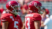 Alabama quarterbacks Taulia Tagovailoa (5) and Tua Tagovailoa warm up before an SEC game against Ole Miss on Sept. 28, 2019, at Bryant-Denny Stadium in Tuscaloosa.