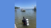 Authorities are searching for a paralyzed man whose raft was recovered Friday afternoon on Lake Eufaula.