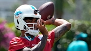 Miami Dolphins quarterback Tua Tagovailoa passes at practice on June 5, 2024, in Miami Gardens, Fla.