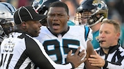 Officials restrain Carolina Panthers defensive tackle Derrick Brown during an NFL game against the Jacksonville Jaguars on Sunday, Dec. 31, 2023, at EverBank Stadium in Jacksonville, Fla.