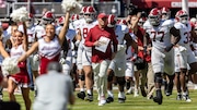 Alabama head coach Kalen DeBoer leads his team onto the field before Alabama's A-Day NCAA college football scrimmage, Saturday, April 13, 2024, in Tuscaloosa, Ala.