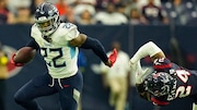 Tennessee Titans running back Derrick Henry (22) runs pat Houston Texans cornerback Derek Stingley Jr. (24) during the first half of an NFL football game Sunday, Oct. 30, 2022, in Houston. (AP Photo/Eric Gay)