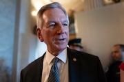 FILE - Sen. Tommy Tuberville, R-Ala., a member of the Senate Armed Services Committee, talks to reporters as he and other senators arrive at the chamber for votes, at the Capitol in Washington, Wednesday, Sept. 6, 2023. Tuberville announced on Tuesday, Dec. 5, that he’s ending his blockade of hundreds of military promotions, following heavy criticism from many of his colleagues in the Senate and clearing the way for hundreds to be approved. (AP Photo/J. Scott Applewhite, File)