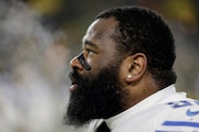 Detroit Lions defensive end Isaiah Buggs warms up before the start of an NFL football game between the Detroit Lions and Green Bay Packers Sunday, Jan. 8, 2023, in Green Bay, Wis. (AP Photo/Matt Ludtke)