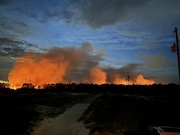 Smoke from a fire in Bon Secour National Wildlife Refuge in Fort Morgan, Ala. around 10 p.m. on Wed., July 17, 2024. The fire is still smoldering as of Fri., July 19, 2024. (Photo courtesy Jamie Strategier)